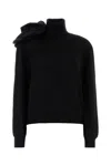 Moschino Black Turtleneck Sweater With Flower Detail In Black