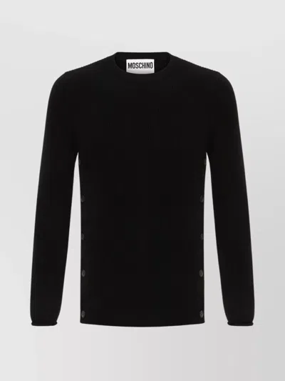 MOSCHINO KNITWEAR WITH BUTTON DETAILING AND CREW NECK