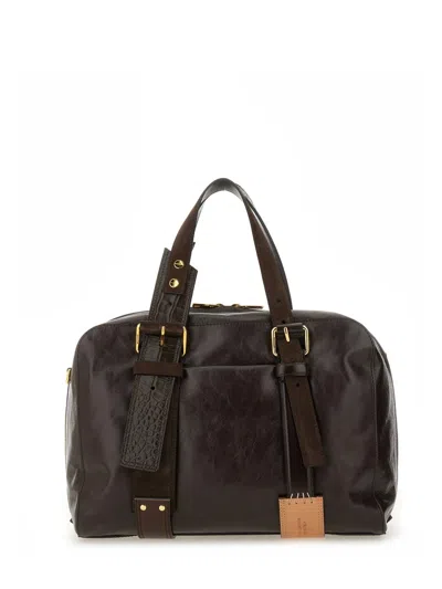 Moschino Leather Bag. In Brown