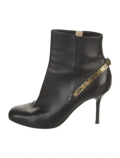Pre-owned Moschino Leather Graphic Print Boots In Black