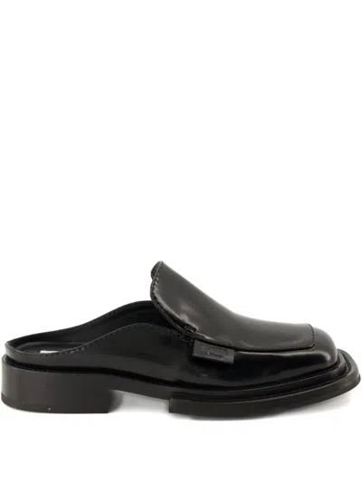 Moschino Leather Mules In Black