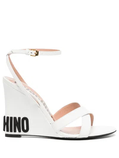 Moschino Women's Logo Crossover Wedge Heel Sandals In Bianco