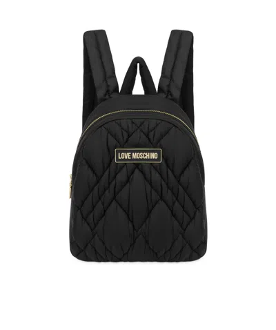 Moschino Logo-appliqué Quilted Backpack In Black