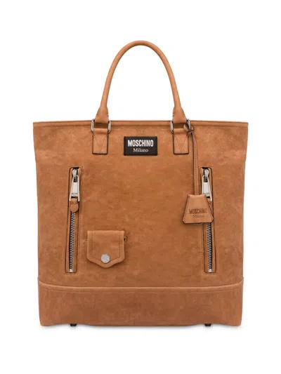 Moschino Logo-appliqué Suede Tote Bag In Brown
