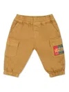 Moschino Logo-appliqué Trousers In Neutrals