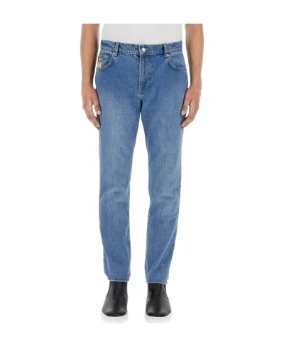 Moschino Logo Denim Trousers In Blue