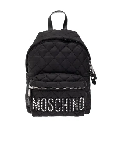 Moschino Logo Embellished Backpack In Black