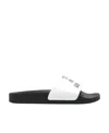 Moschino Logo-embossed Faux-leather Slides In Black