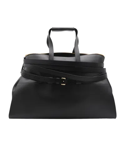 Moschino Logo Embossed Large Tote Bag In Black