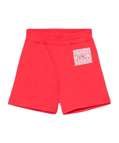 Moschino Logo-embossed Shorts In Orange
