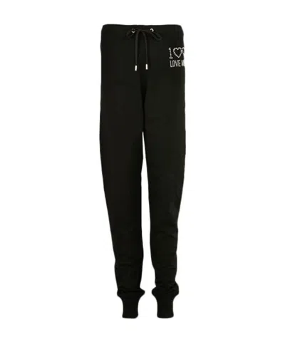 Moschino Logo Lace Up Sweatpants In Black