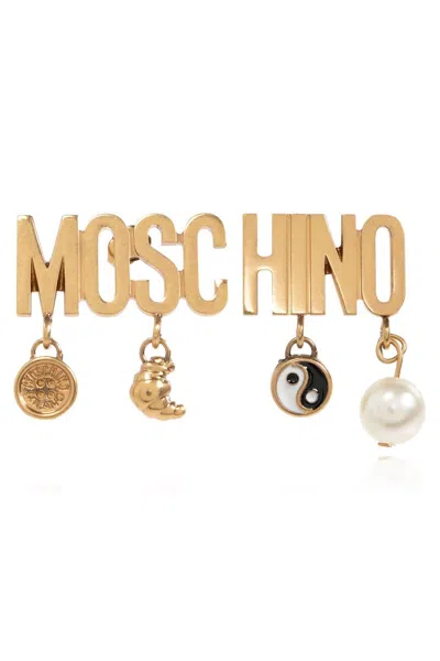 Moschino Logo Lettering Charm Detailed Earrings In Gold