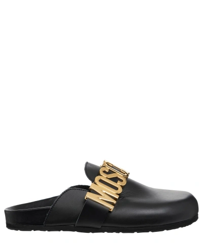 Moschino Logo Lettering Mules In Black