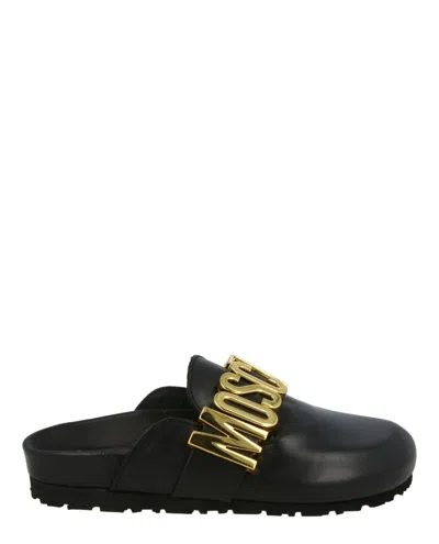 Moschino Logo Lettering Mules In Black