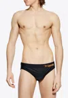 Moschino Logo Lettering Swimming Briefs In Black