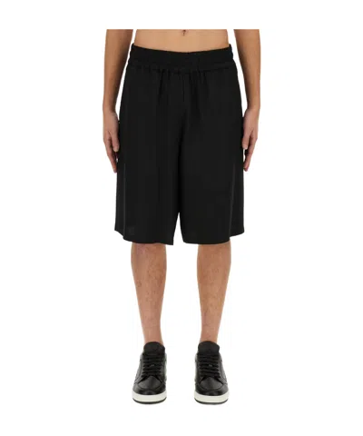 MOSCHINO LOGO-PATCH CREPE SHORTS