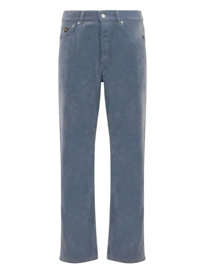 Moschino Logo-patch Jeans In Blue