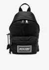 Moschino Logo-patch Quilted Backpack In Black