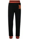 Moschino Logo Patch Track Pants In Schwarz