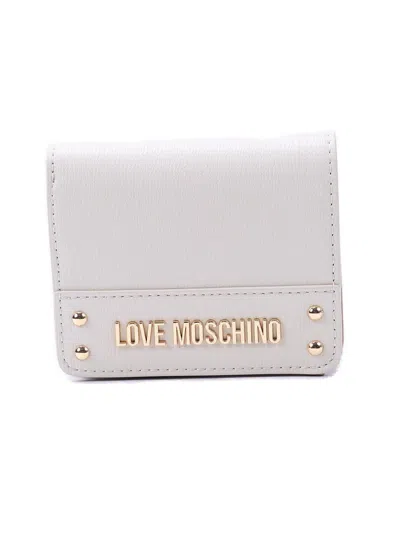 Moschino Logo-plaque Press-stud Fastened Bi-fold Wallet In Avorio