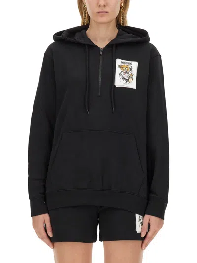 Moschino Logo Print Hooded Sweatshirt For Women In Black
