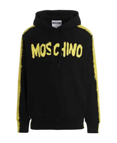MOSCHINO MOSCHINO GRAFFITI LOGO PRINTED DRAWTRING HOODIE