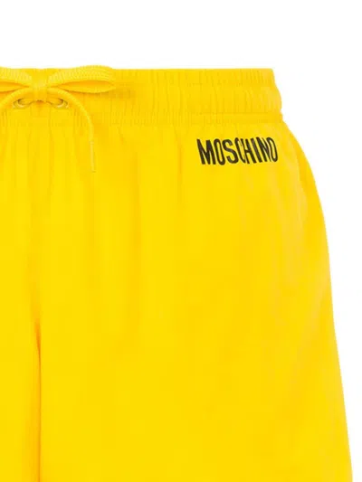 MOSCHINO LOGO-PRINT SWIM SHORTS