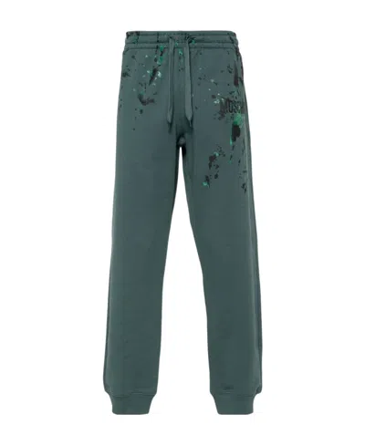 MOSCHINO LOGO-PRINT TRACK PANTS