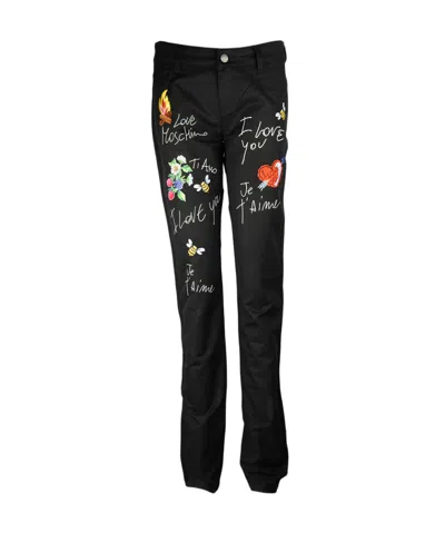 Moschino Logo Printed Jeans In Black