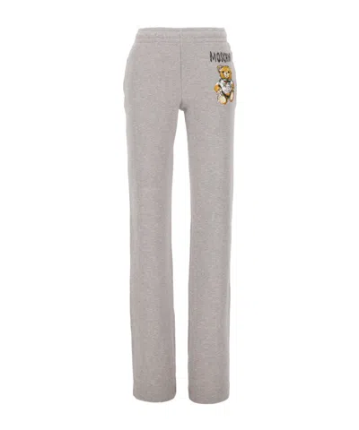 MOSCHINO MOSCHINO LOGO TEDDY BEAR PRINTED STRAIGHT-LEG TROUSERS