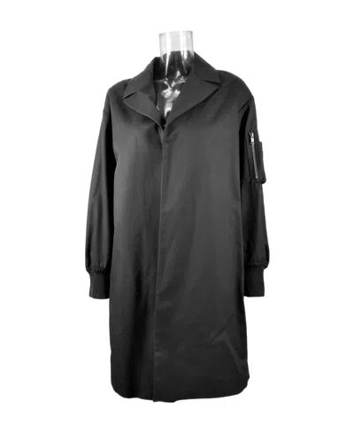Moschino Logo Trench Coat In Black
