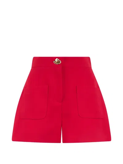 Moschino Logo-button Patch-pocket Shorts In Red