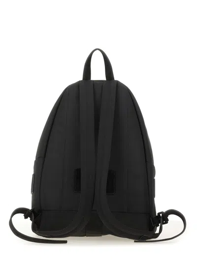 Moschino Logo-embroidered Backpack In Black