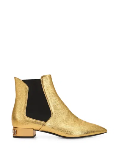 Moschino Logo-plaque Chelsea Boots In Gold