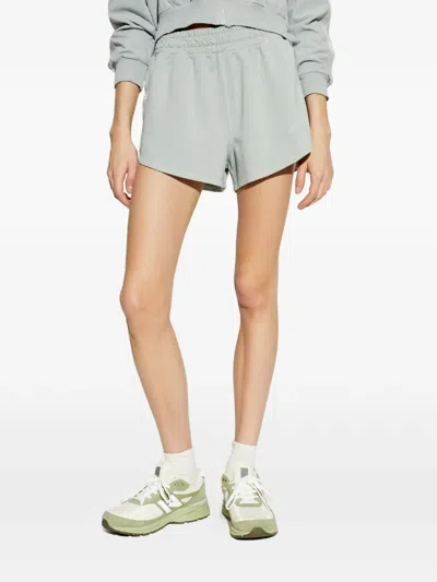 Moschino Logo-tape Curved-hem Shorts In Green