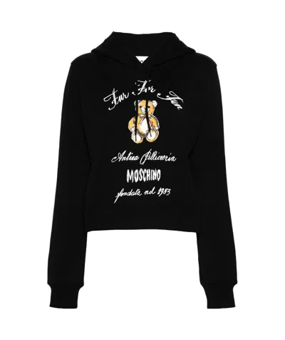 Moschino Long-sleeved Sweater In Black