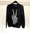 Moschino Long-sleeved Sweater In Black