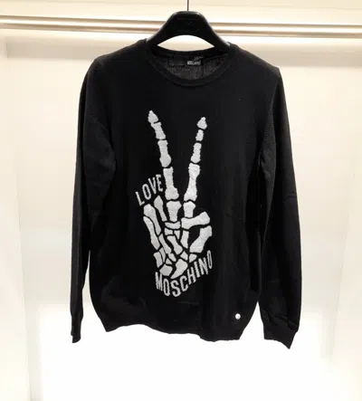 Moschino Long-sleeved Sweater In Black