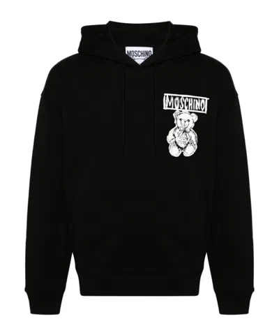 Moschino Long-sleeved Sweater In Black