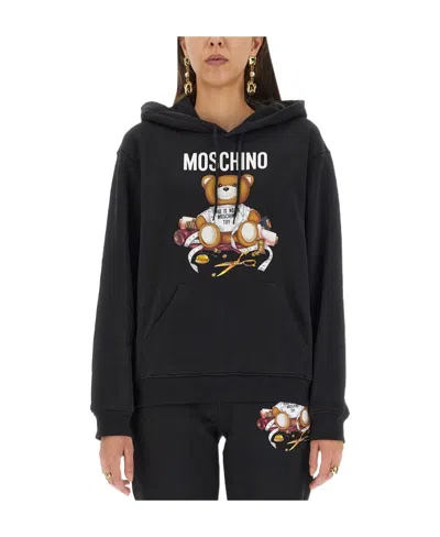 Moschino Long-sleeved Sweater In Black