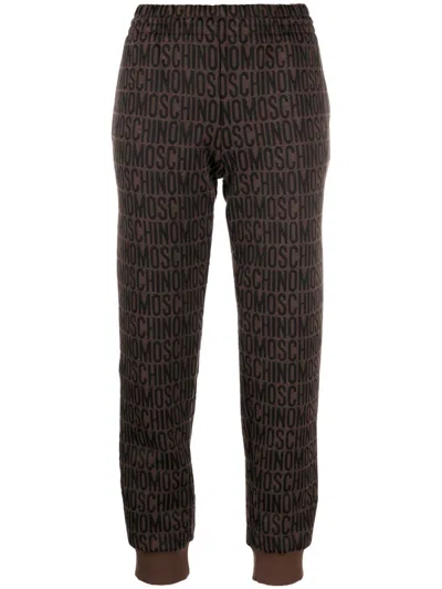 Moschino Monogram-print Joggers In Brown