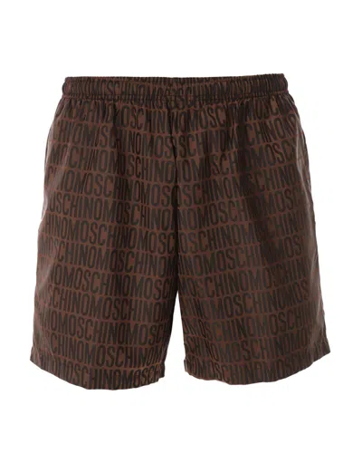 Moschino Monogram Printed Elasticated Waist Swim Shorts In Brown