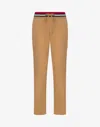 Moschino Logo-appliqué Track Pants In Beige