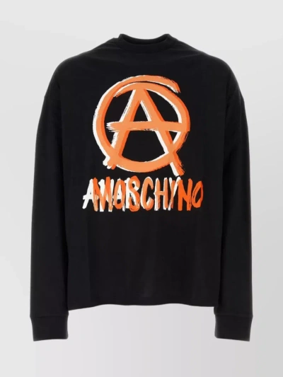 MOSCHINO OVERSIZE LONG SLEEVE T-SHIRT WITH ANARCHY PRINT