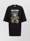 Moschino Oversized Crew Neck T-shirt Dress With Graphic Print In Black