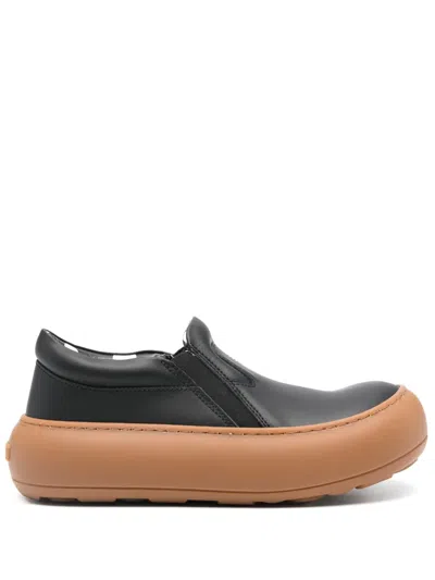 Moschino Oversized-sole Leather Sneakers In Black