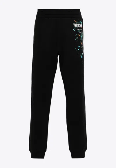 MOSCHINO PAINT EFFECT TRACK PANTS