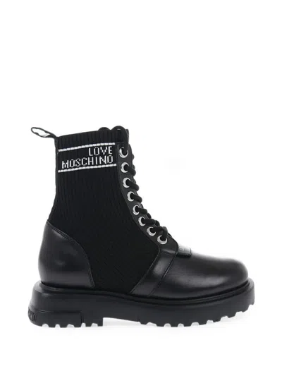 Moschino Panelled Lace-up Combat Boots In Black