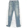 Moschino Ruffled Overlay Distressed Jeans In Blue