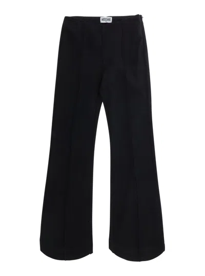 Moschino Patch-detail Cotton Trousers In Black